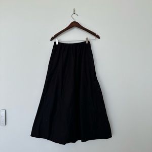 Reformation, black skirt